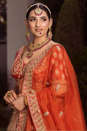 Rusty Orange Bridal Lehenga with Hand Stitched Workmanship  Paired with Crop Top and Dupatta