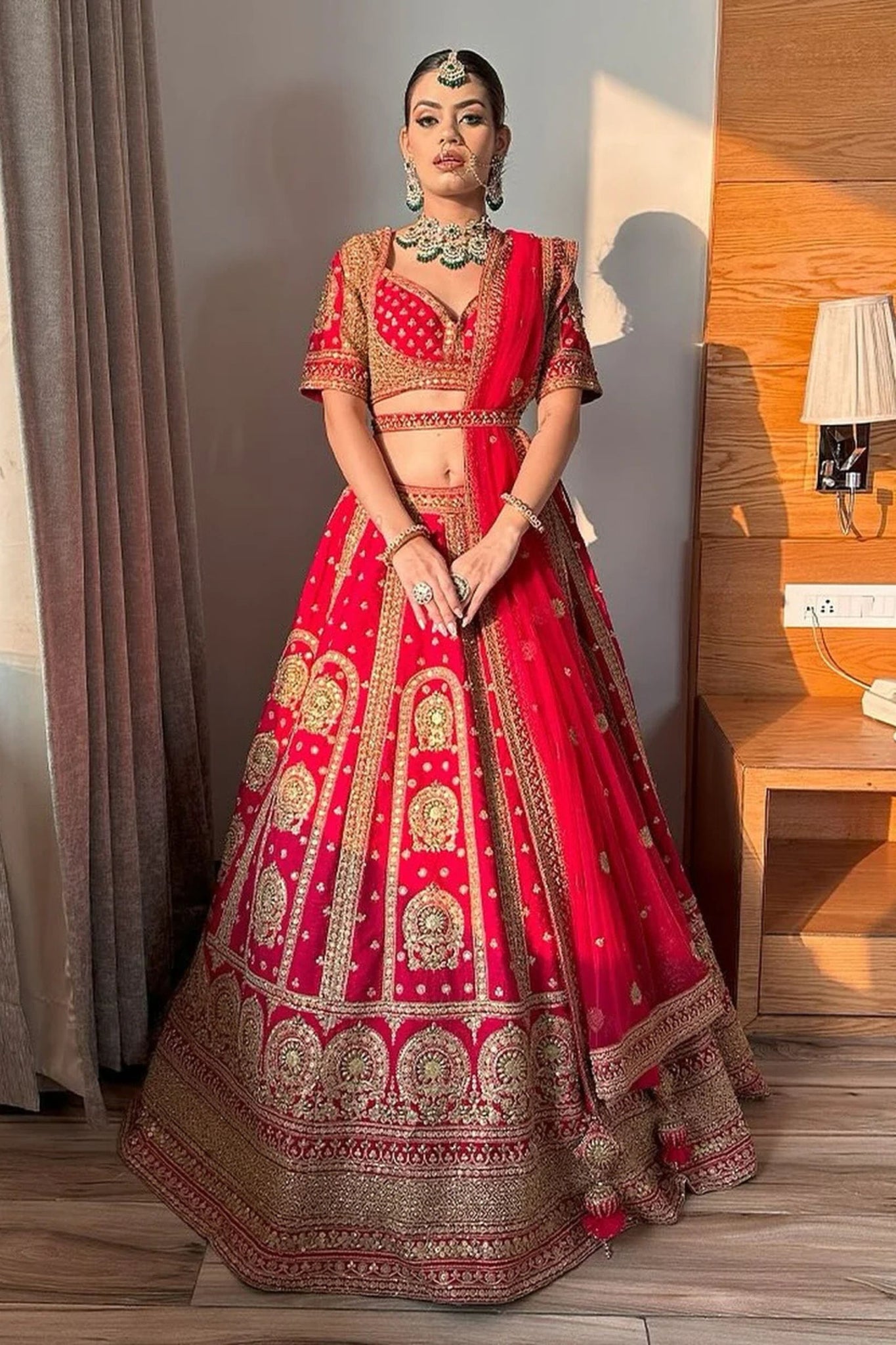 Coral Pink Bridal Lehenga with Golden Embroidery