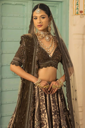 Ivory and Mehendi Hued Bridal lehenga with Resham Work Paired with Micro Blouse, Odhani and Bubble Net Dupatta.