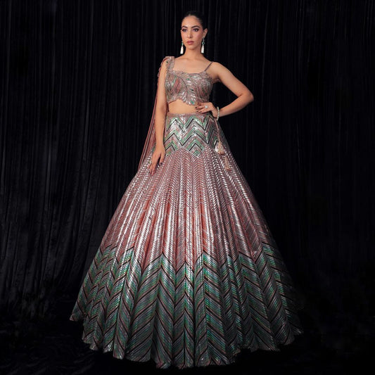 Metallic Diagonal Leather Crafting on Flared Lehenga  Paired with Applique Embellished Top and attachable duappata