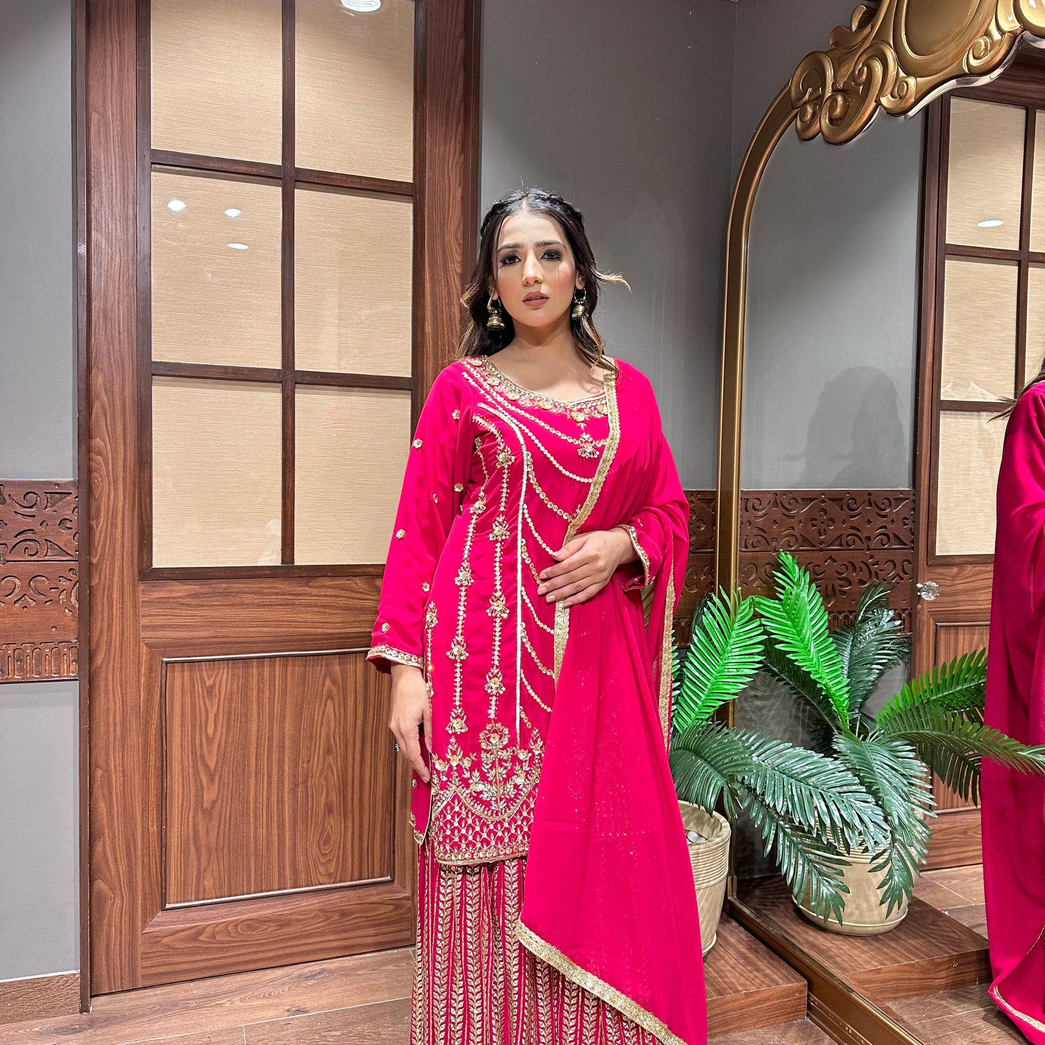 Fluorescent Hot Pink Garara Suit with Zarkan and Nalki Work