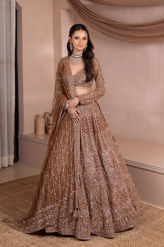 Copper Gold Hued Flairy Lehenga Stunningly Paired with Crop Top and Dupatta