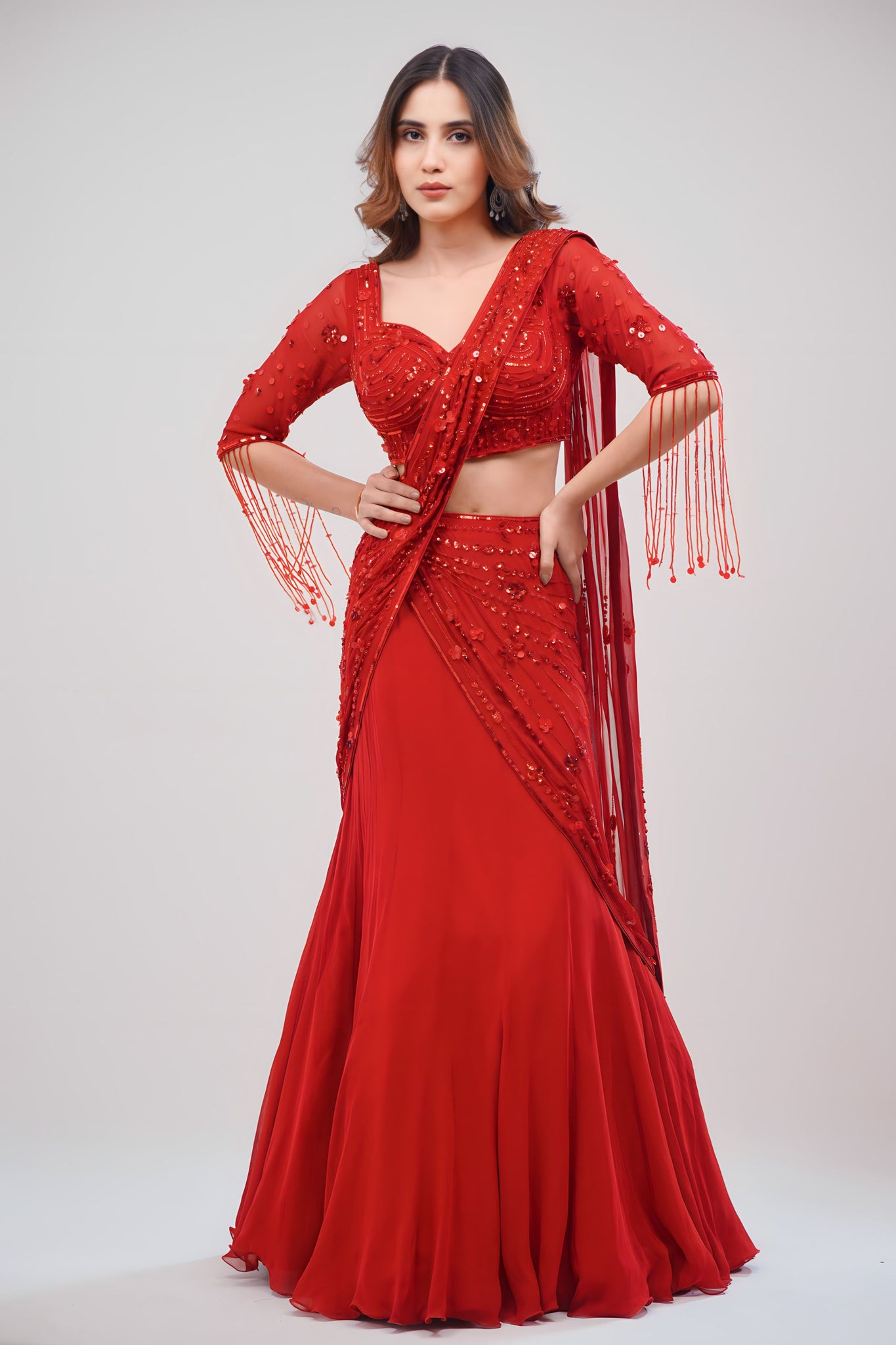 Hand stitched Coral Red Lehenga Cum Saree With Graceful Drape