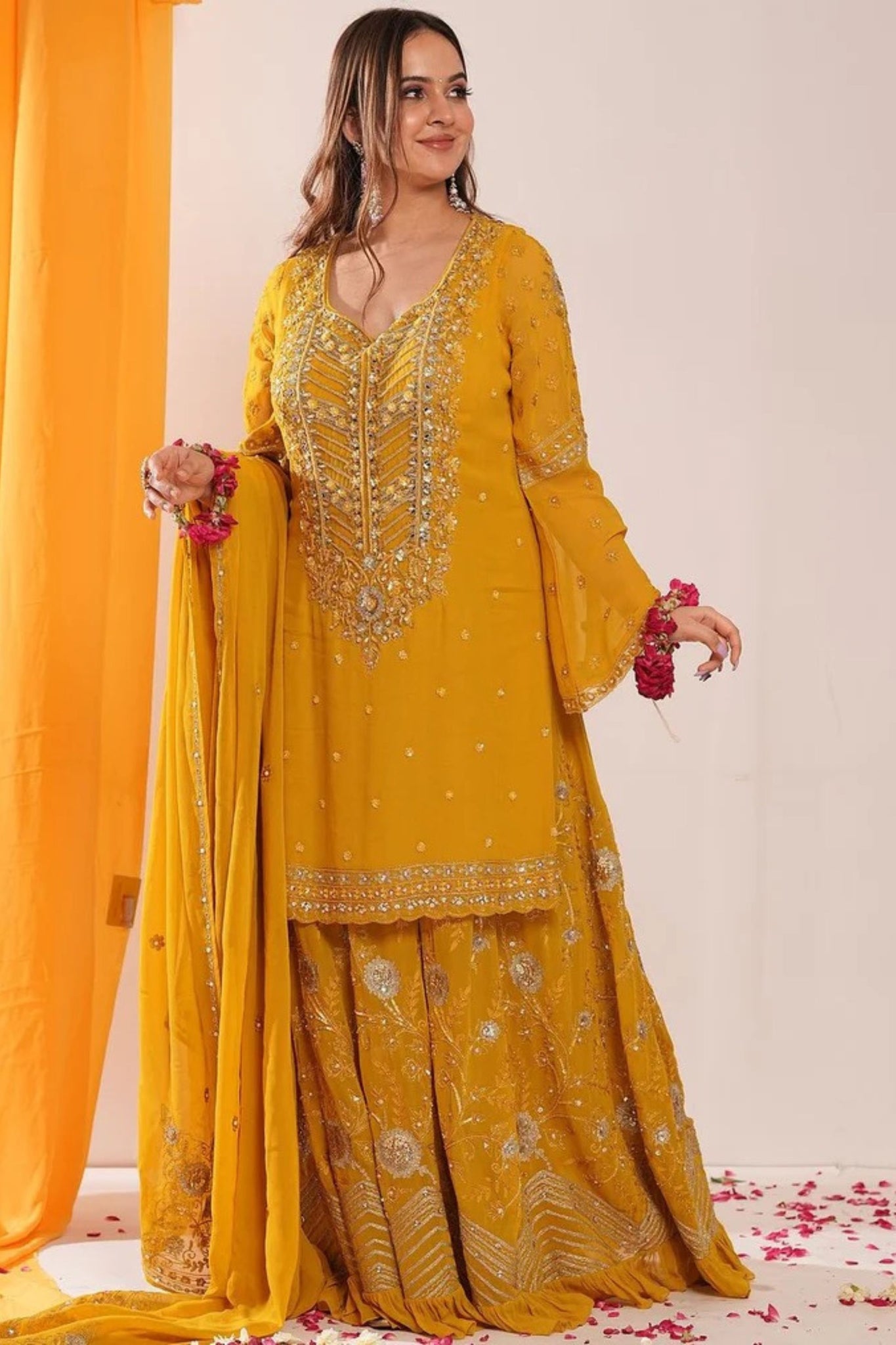 Bright mustard shaded Pakistani garara suit with dupatta