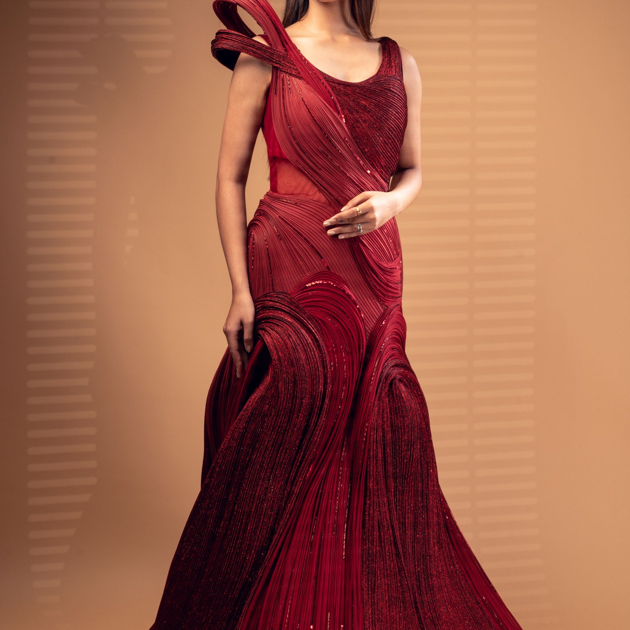 Red sequence Gown with exaggerated shoulder