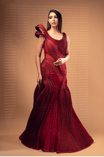 Red sequence Gown with exaggerated shoulder