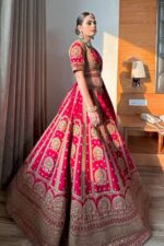 Coral Pink Bridal Lehenga with Golden Embroidery
