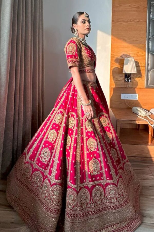 Coral Pink Bridal Lehenga with Golden Embroidery