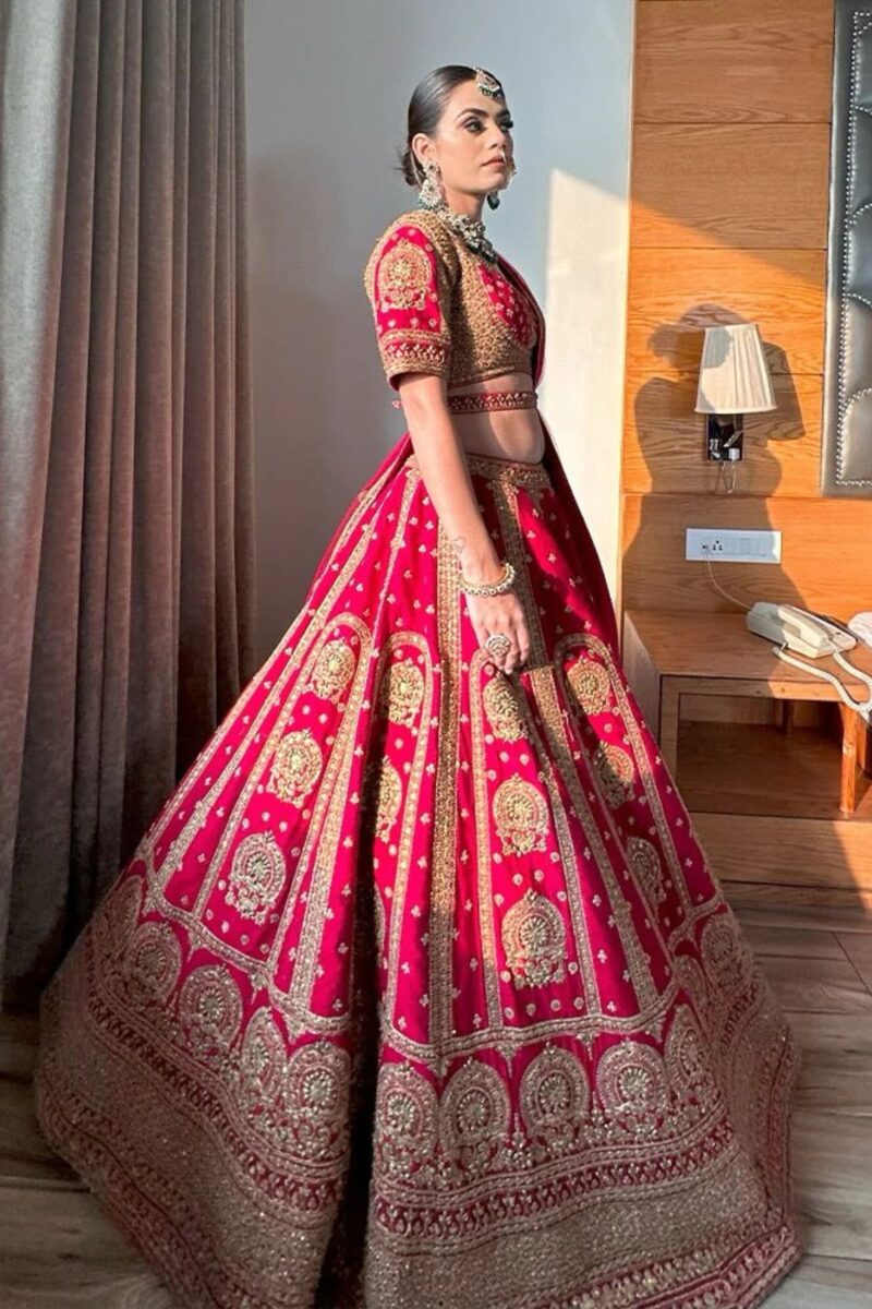 Coral Pink Bridal Lehenga with Golden Embroidery