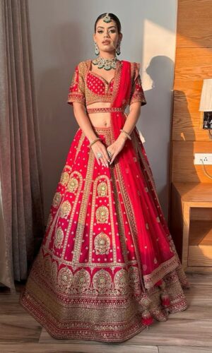 Coral Pink Bridal Lehenga with Golden Embroidery