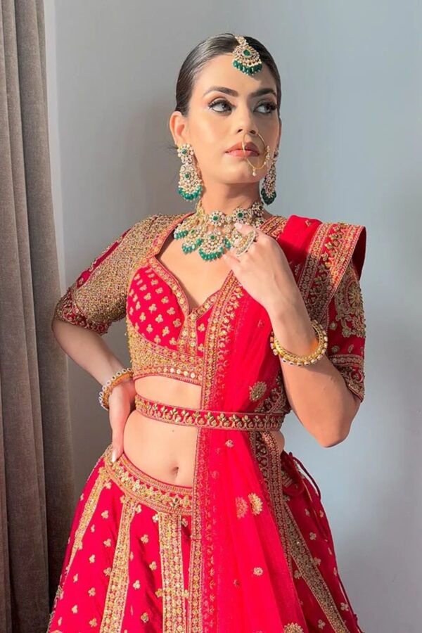 Coral Pink Bridal Lehenga with Golden Embroidery