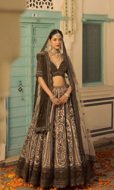 Ivory and Mehendi Hued Bridal lehenga with Resham Work Paired with Micro Blouse, Odhani and Bubble Net Dupatta.