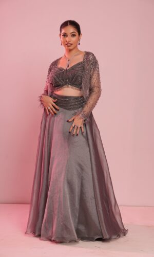 Flairy Metallic Pastel Grey Lehenga Choli with Beads and Bubble Net Shrug
