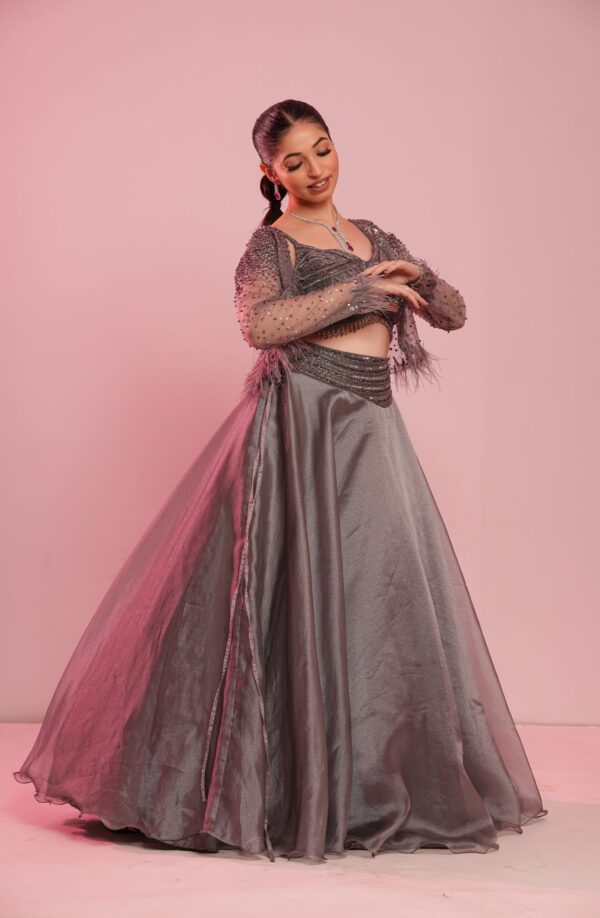 Flairy Metallic Pastel Grey Lehenga Choli with Beads and Bubble Net Shrug