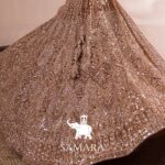 Copper Gold Hued Flairy Lehenga Stunningly Paired with Crop Top and Dupatta