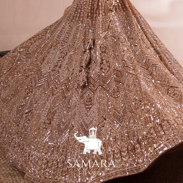 Copper Gold Hued Flairy Lehenga Stunningly Paired with Crop Top and Dupatta