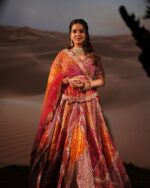 Traditional Lehenga In Orange And Rani Pink With Crop Top And A Dupatta