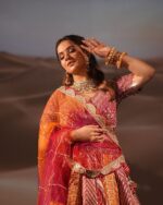 Traditional Lehenga In Orange And Rani Pink With Crop Top And A Dupatta
