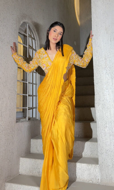 Bright yellow hued girly readymade drape saree.