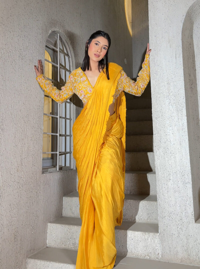 Bright yellow hued girly readymade drape saree.