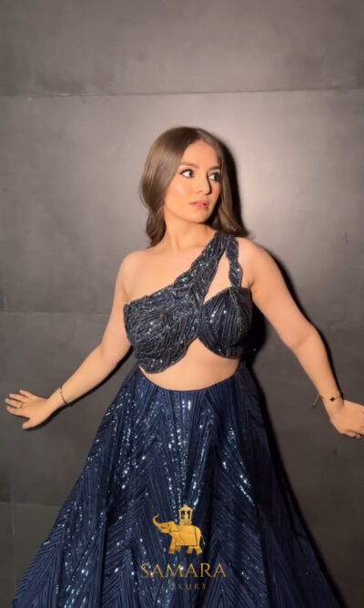 Dark blue shaded flairy lehenga with off shoulder top