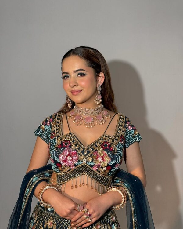 Flairy Dark Blue Hued Heavy Lehenga Paired with an Elegant Top and Dupatta