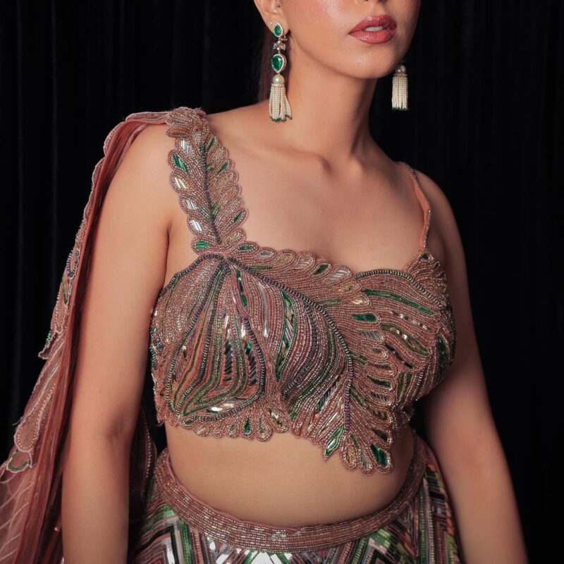 Metallic Diagonal Leather Crafting on Flared Lehenga  Paired with Applique Embellished Top and attachable duappata