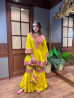 Mango Shaded Pakistani Anarkali Garara Suit with Appliqué Crafting and a Cute Potli.
