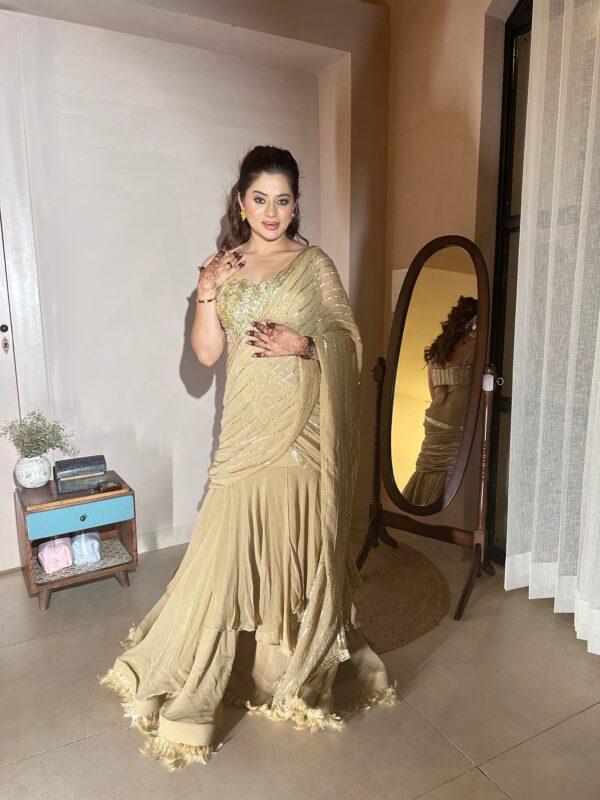 Rich gold hued ready made  cum saree