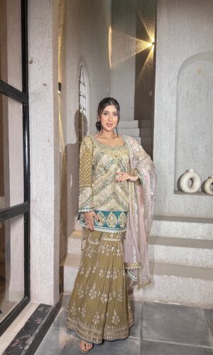 Light beige hued embroided  garara suit with dupatta