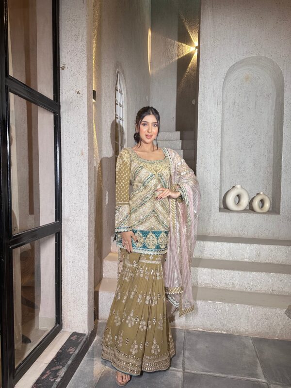 Light beige hued embroided  garara suit with dupatta