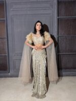 Rich gold hued pleated skirt with embroided top