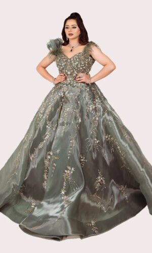 Metal Green Engagement Gown with Hand Stitched Details, Feathered Shoulders and Elegant Flare