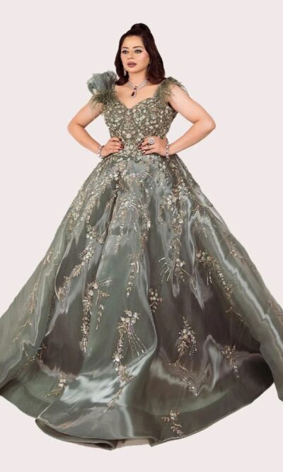 Metal Green Engagement Gown with Hand Stitched Details, Feathered Shoulders and Elegant Flare