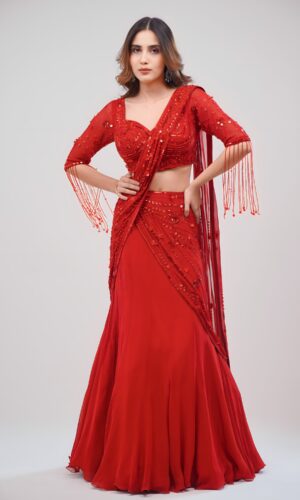 Hand stitched Coral Red Lehenga Cum Saree With Graceful Drape