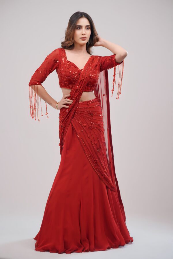 Hand stitched Coral Red Lehenga Cum Saree With Graceful Drape