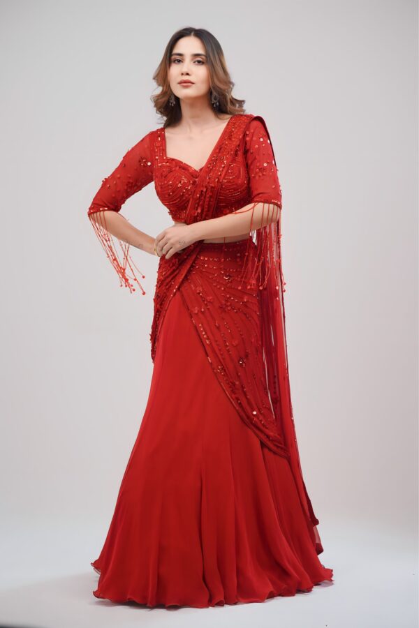 Hand stitched Coral Red Lehenga Cum Saree With Graceful Drape