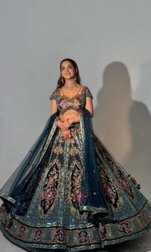 Flairy Dark Blue Hued Heavy Lehenga Paired with an Elegant Top and Dupatta