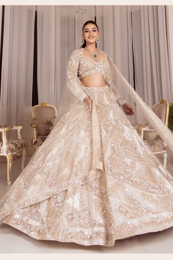 Ivory Hue Flairy Lehenga Fully Hand Stitched Paired with Crop Top and Dupatta