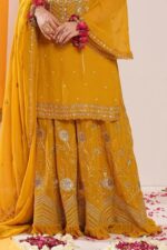 Bright mustard shaded Pakistani garara suit with dupatta