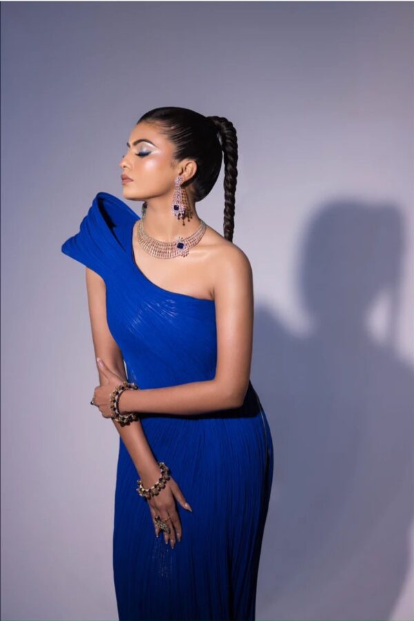 Cobalt blue exaggerated shoulder sculpted gown