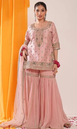 Powder peach hued embroided garara suit with dupatta
