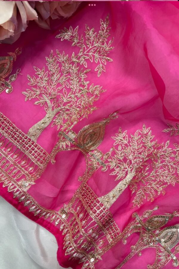 Rani Pink Unstitched Pakistani Suit Adorned with Golden Zari