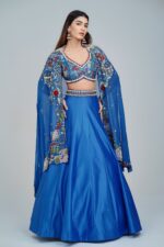 Mesmerizing Turquoise Blue Lehenga with Floral Embroidered Cape Ensemble