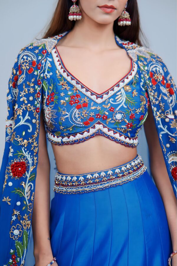 Mesmerizing Turquoise Blue Lehenga with Floral Embroidered Cape Ensemble