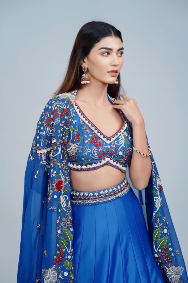 Mesmerizing Turquoise Blue Lehenga with Floral Embroidered Cape Ensemble