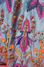 Sky Blue Boat Neck Lehenga with Matching Blouse and Net Dupatta.
