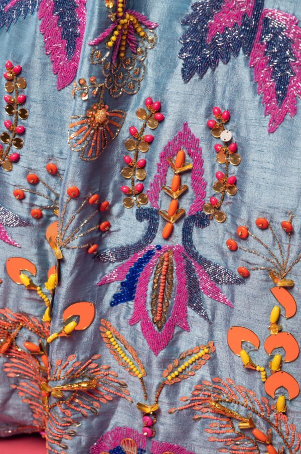 Sky Blue Boat Neck Lehenga with Matching Blouse and Net Dupatta.
