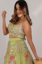 Parrot Green Lehenga Choli in Japanese Net with Aari Embroidery, Paired with Matching Blouse.