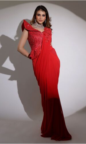 Turkey Red Hued Drape Saree in Lycra with Exaggerated Shoulders.